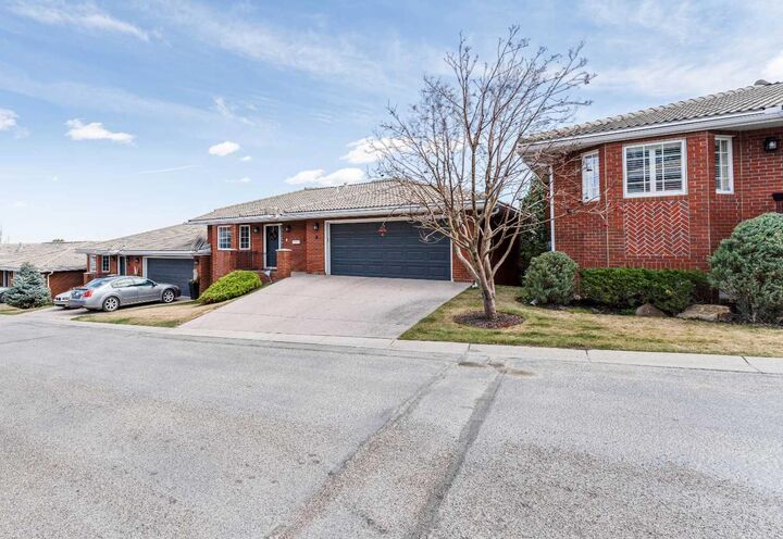 Property Photo: 8 Prominence Path SW AB T3H 2W7