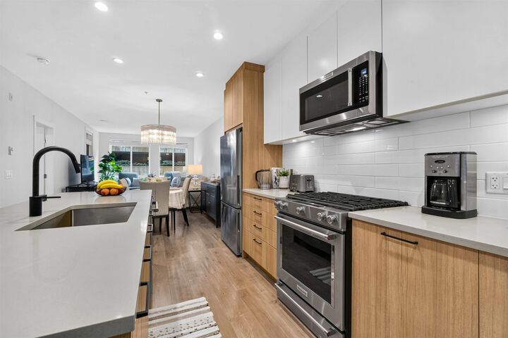 Property Photo: 707 Como Lake Avenue 103 BC V3J 0J5