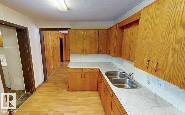 Property Photo: 4708 47 Avenue AB T7A 1H7