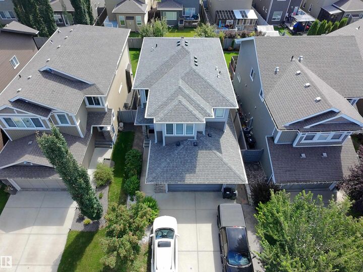 Property Photo:  8719 218 Street NW  AB T5T 4R7 