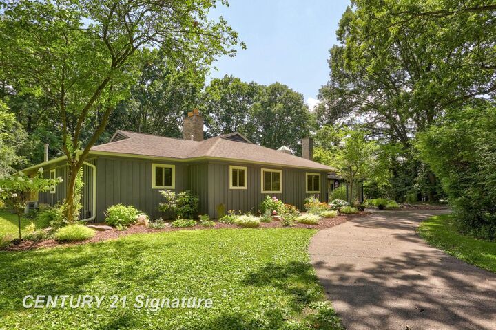 Property Photo:  1 N Center Woods Drive  MI 48638 