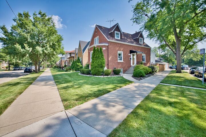 Property Photo:  5974 W Miami Avenue  IL 60646 