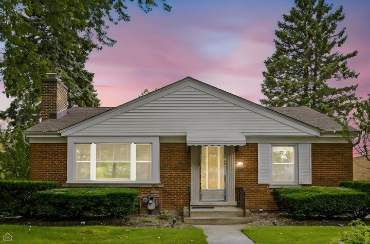 Property Photo: 8716 N Harding Avenue IL 60076