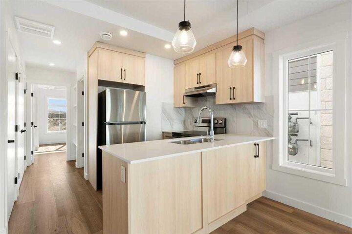Property Photo: 156 Park Street 402 AB T4C 3H3