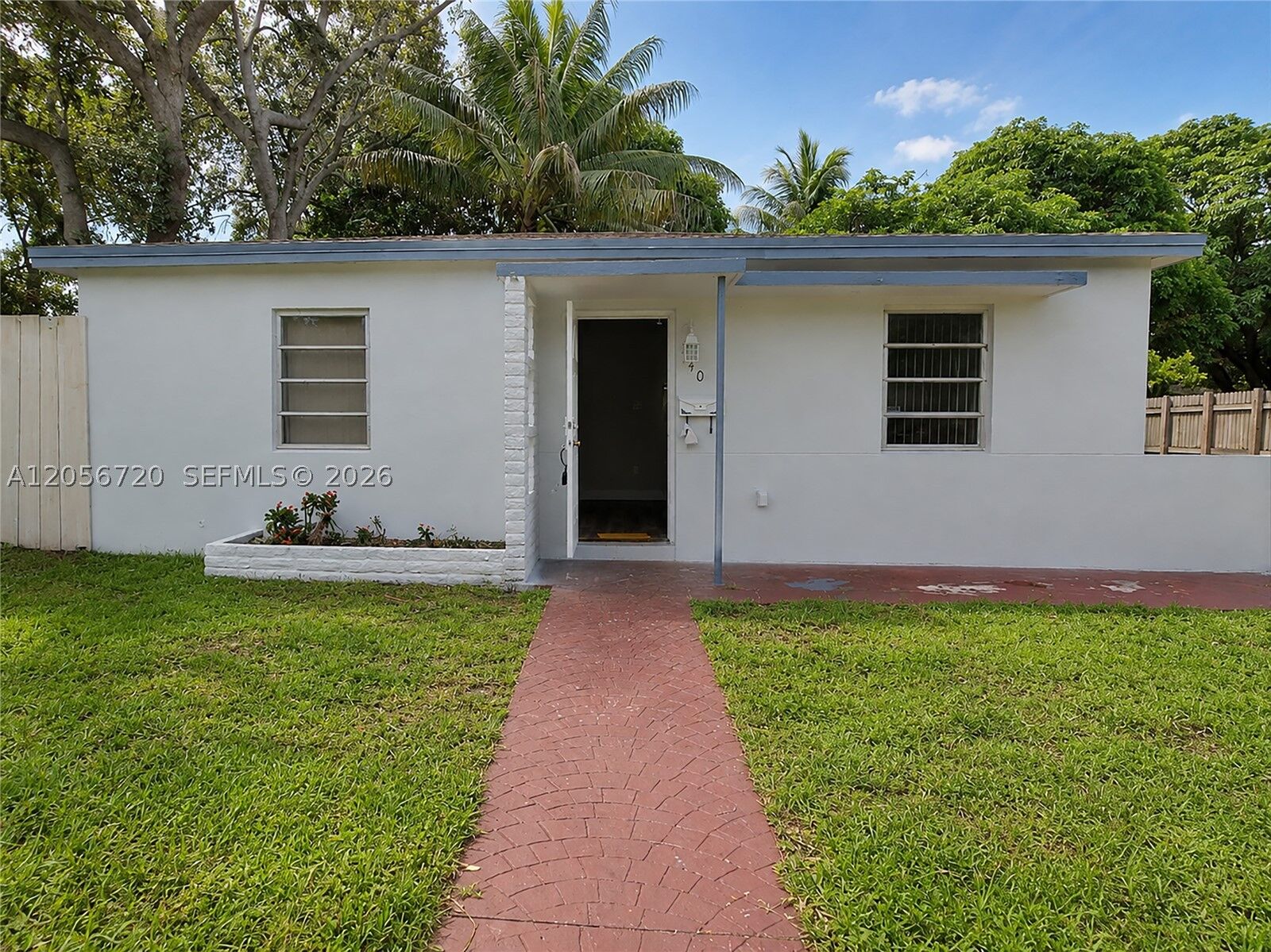 Property Photo:  740 NW 130th St  FL 33168 