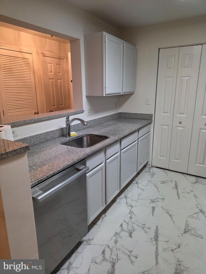 Property Photo:  8095 Lacy Drive 202  VA 20109 