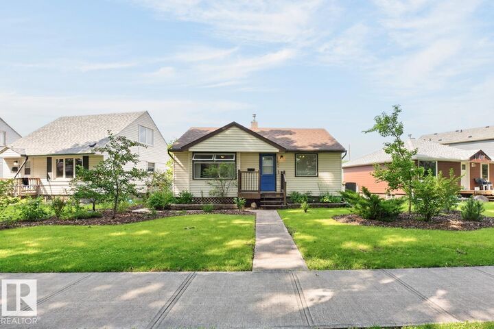 Property Photo:  11834 59 Street NW  AB T5W 3X7 