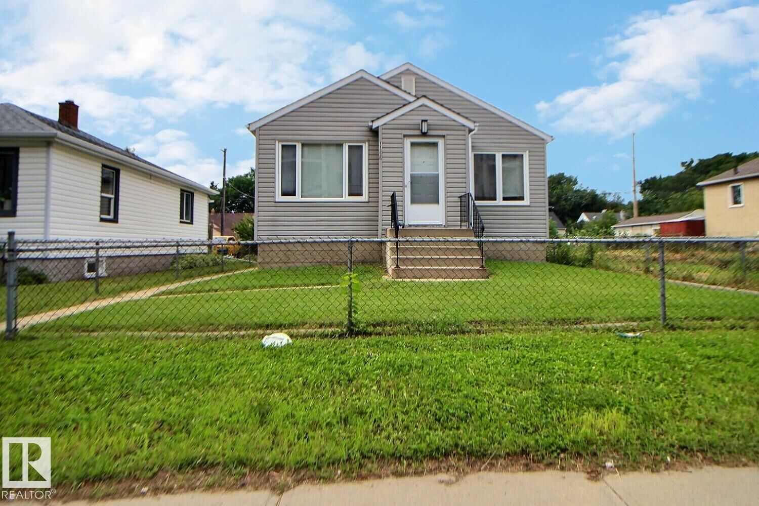Property Photo: 11336 83 Street NW AB T5B 2Y1