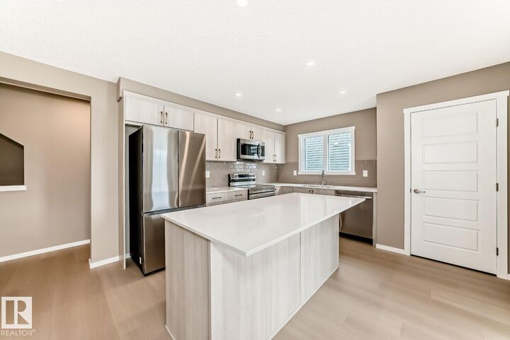 Property Photo:  1214 Stoneside Road  AB T8H 3A4 