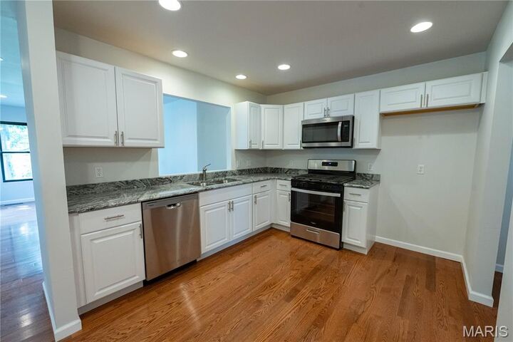 Property Photo: 6903 Singingwood Lane MO 63129