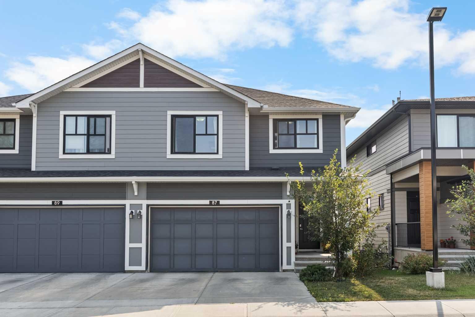 Property Photo: 87 Harvest Grove Common NE AB T3K 2M6