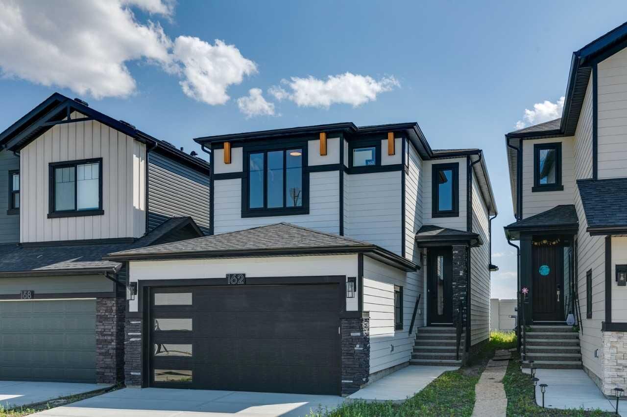 Property Photo: 162 Drystone Way NW AB T3R 2M1