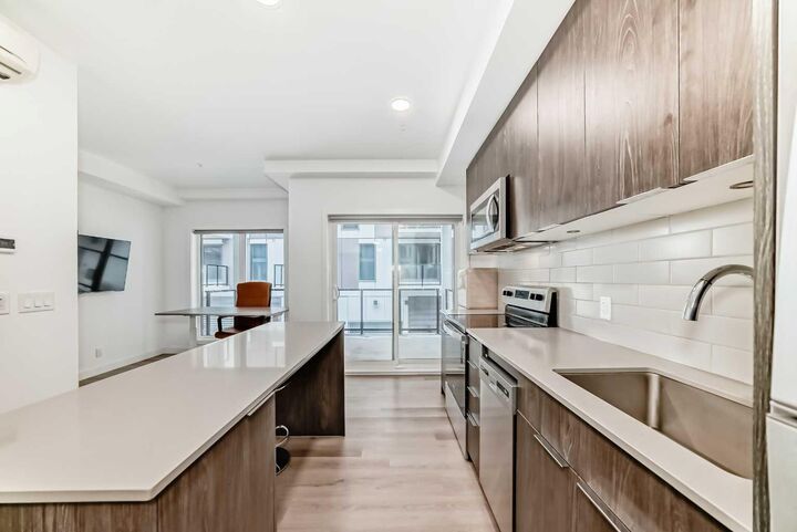 Property Photo:  455 1 Avenue NE 204  AB T2E 0B3 