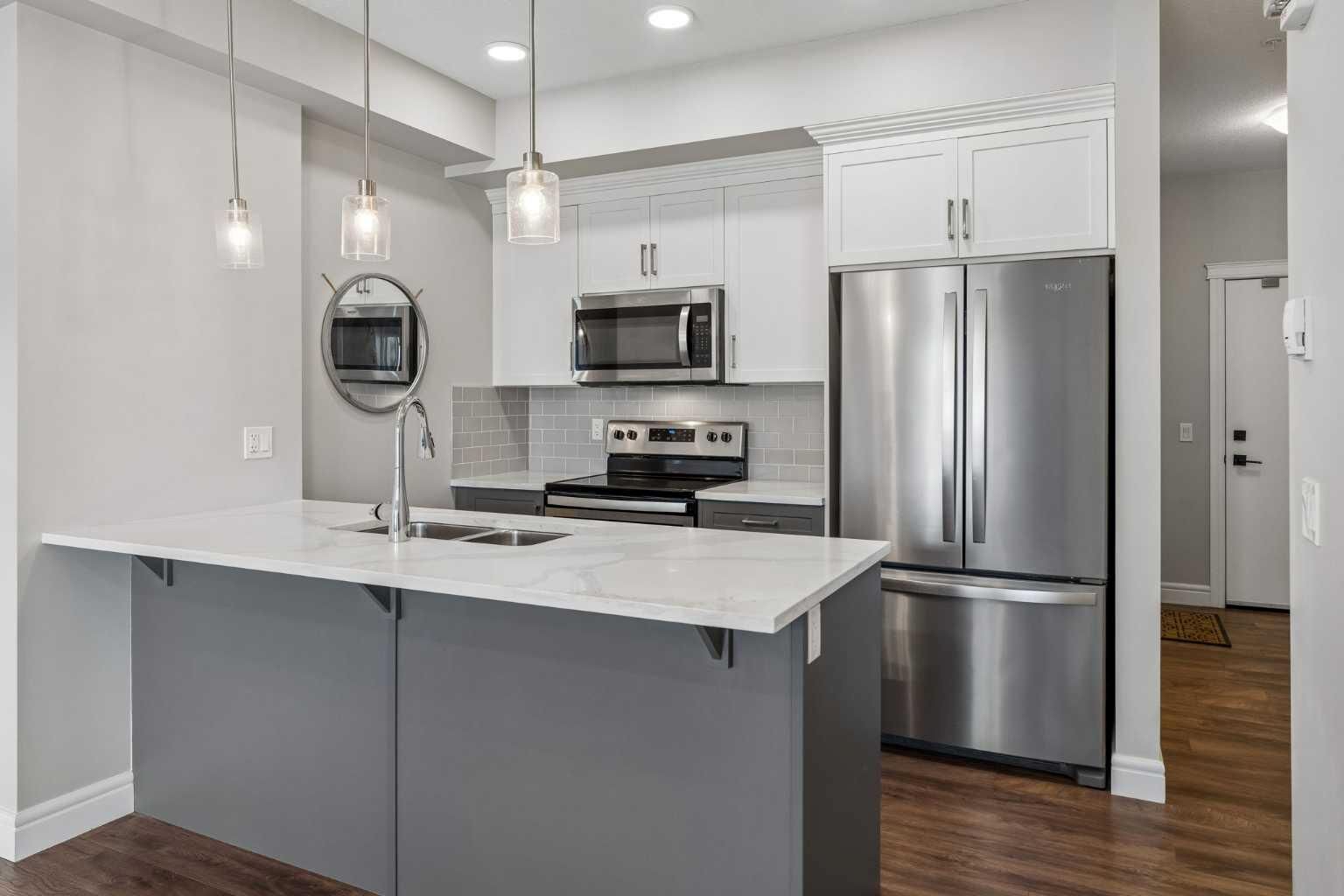 Property Photo: 19621 40 Street SE 108 AB T3M 3B2