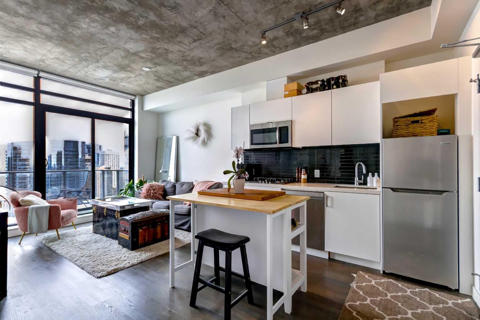 Property Photo:  1010 6 Street SW 3004  AB T2R 1B4 