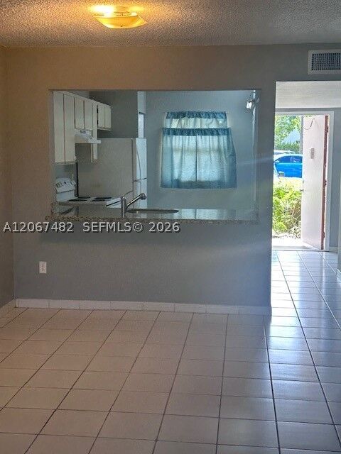Property Photo: 20735 NE 8th Ct 101-12 FL 33179