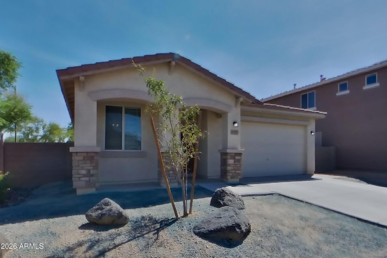 Property Photo: 17307 W Monroe Street AZ 85338