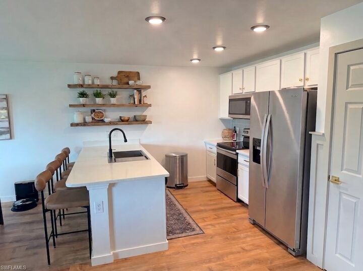 Property Photo: 3192 Estancia Ln FL 33909
