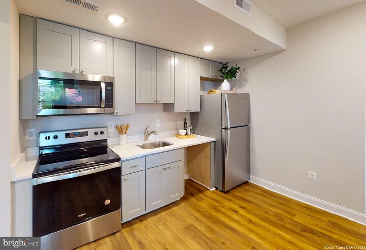 Property Photo: 220 Hamilton Street NW 114 DC 20011