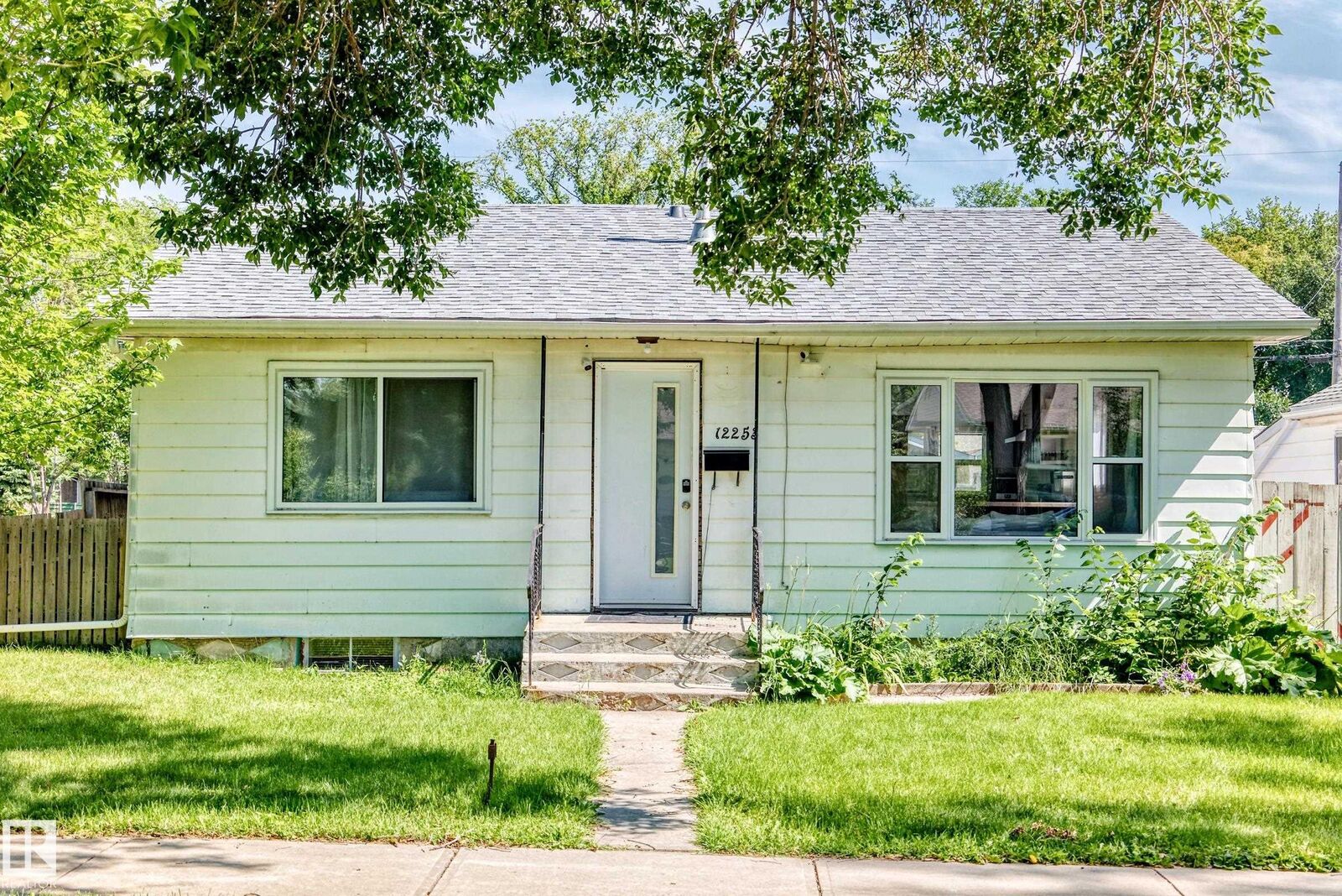 Property Photo: 12253 94 Street NW AB T5G 1K2