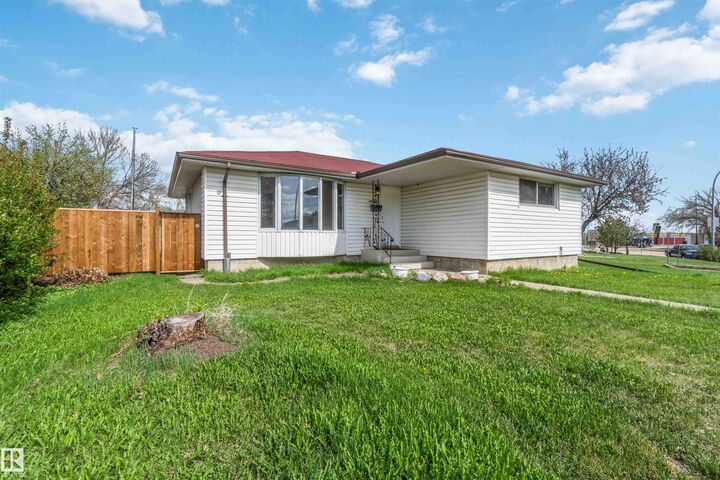 Property Photo: 13303 58 Street NW AB T5A 0P9