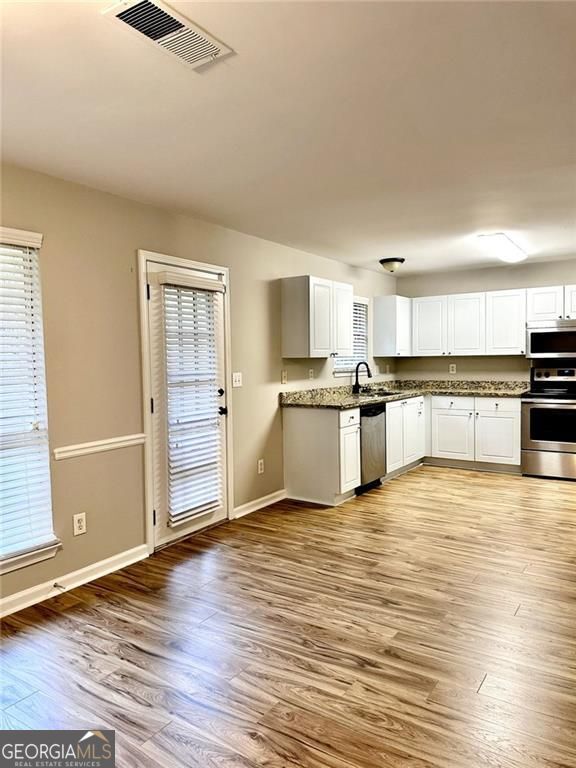 Property Photo:  5670 Windswept Trace  GA 30518 