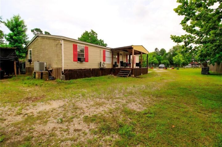 Property Photo:  37 County Road 3479J  TX 77327 