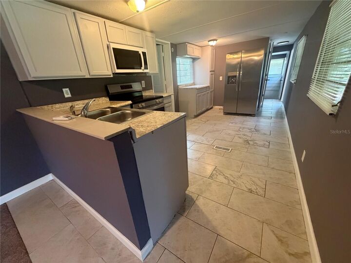 Property Photo: 12938 Lincoln Road FL 33578