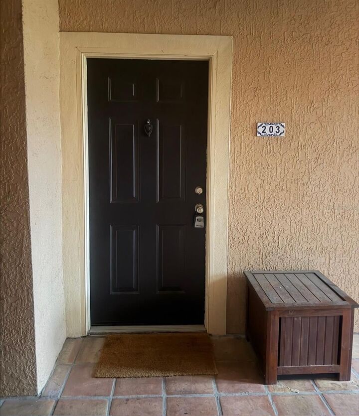 Property Photo: 5572 Metrowest Blvd 203 FL 32811