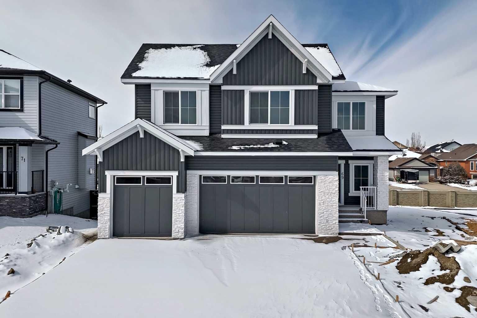 Property Photo: 69 Lakes Estates Circle AB T1P 0B7