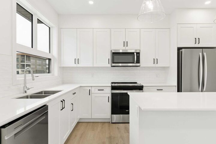 Property Photo: 1475 Naa Drive SW AB T3H 6A4