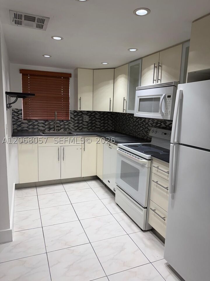 Property Photo:  30 NW 87th Ave C223  FL 33172 