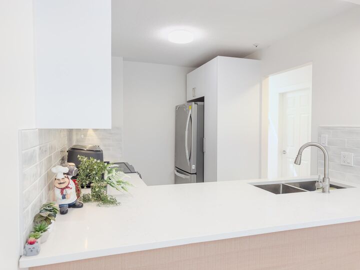 Property Photo: 4893 Clarendon Street 311 BC V5R 3J3