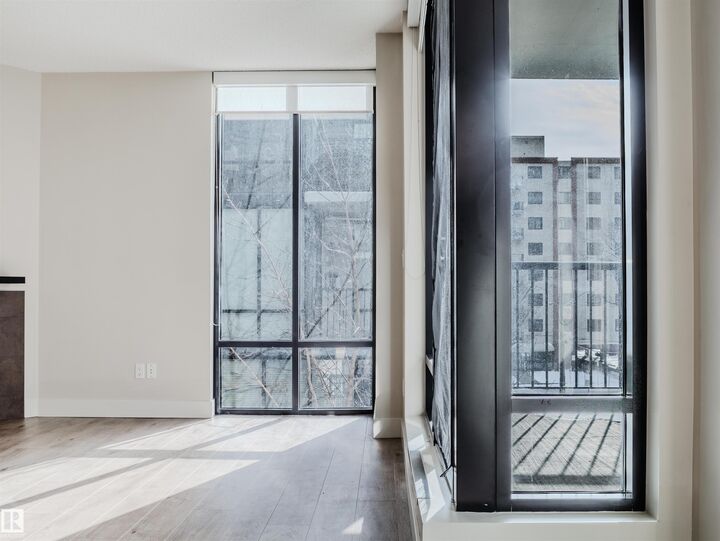Property Photo: 11933 Jasper Avenue NW 304 AB T5K 0P1