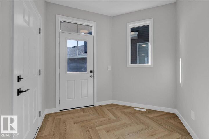 Property Photo:  8308 Kiriak Loop SW  AB T6W 5S2 