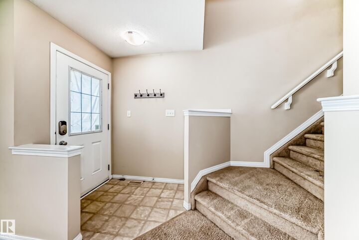 Property Photo: 7706 Schmid Crescent NW AB T6R 0K6