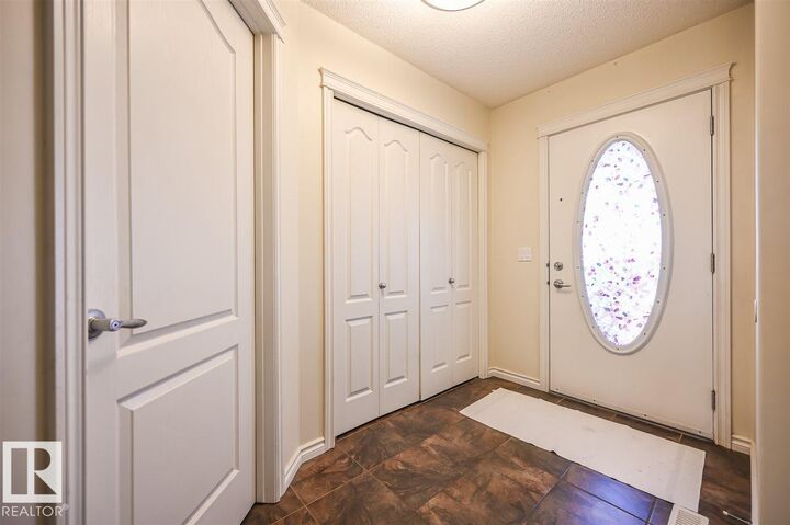 Property Photo:  11425 14 Avenue SW  AB T6W 0N4 