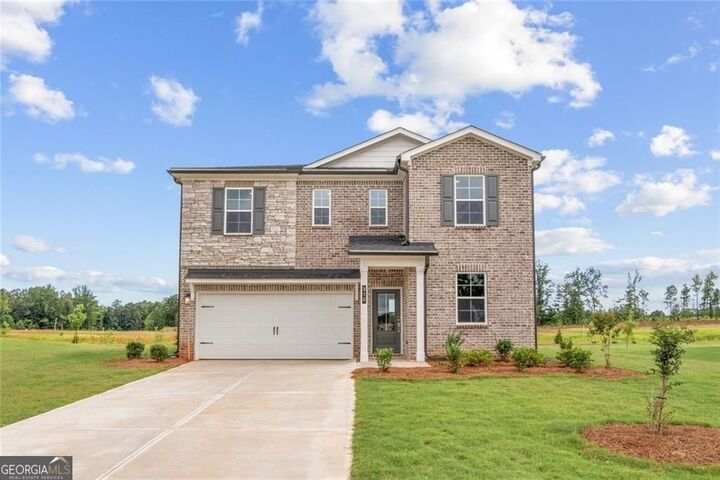 Property Photo:  317 Earnshaw Avenue Lot 110  GA 30253 