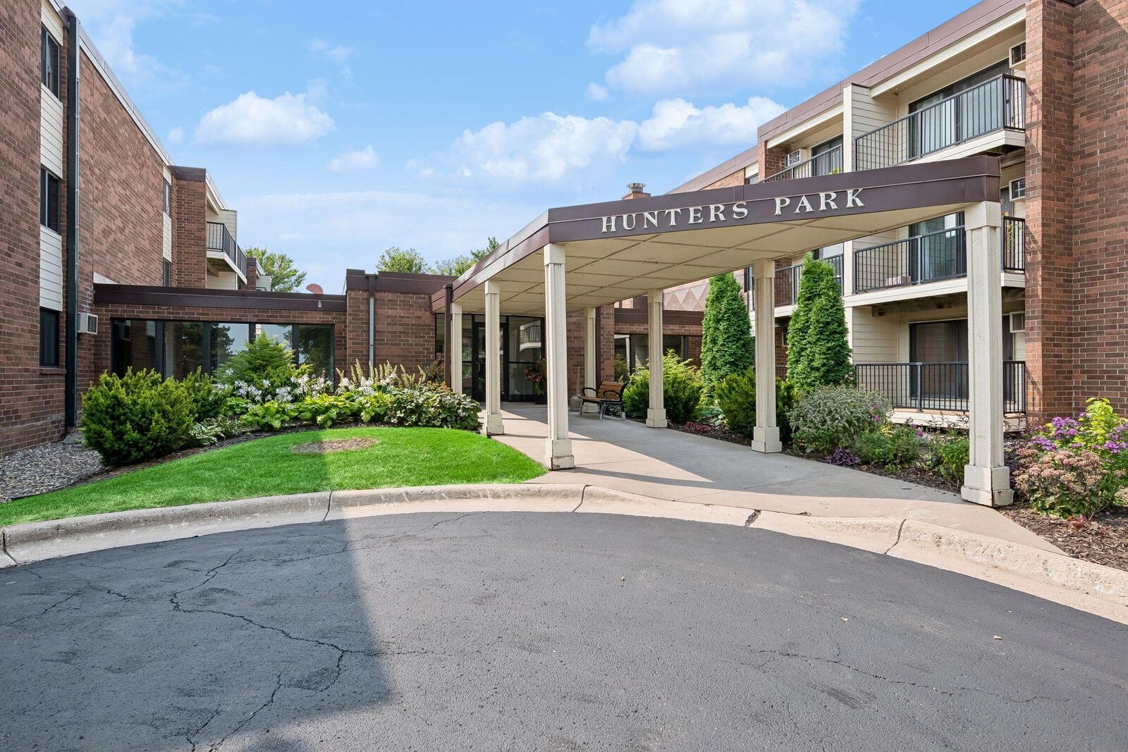 Property Photo:  4 Pine Tree Drive 215  MN 55112 