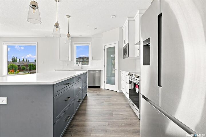Property Photo: 3589 Evans Court 216 SK S4S 0A9