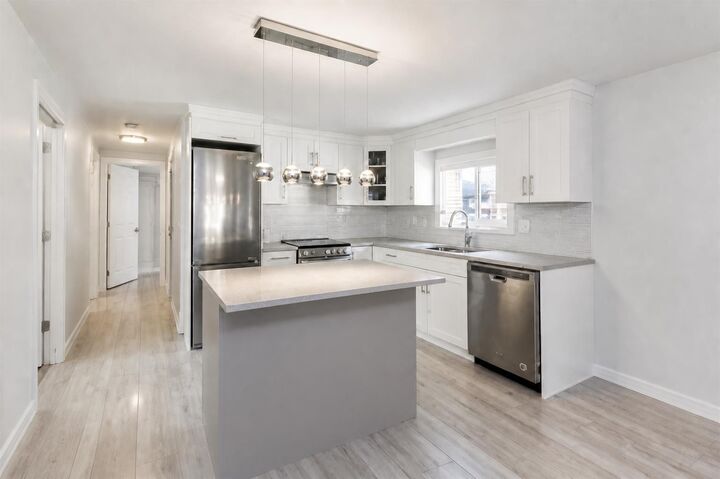Property Photo:  1840 160 Street 221  BC V3A 4X4 