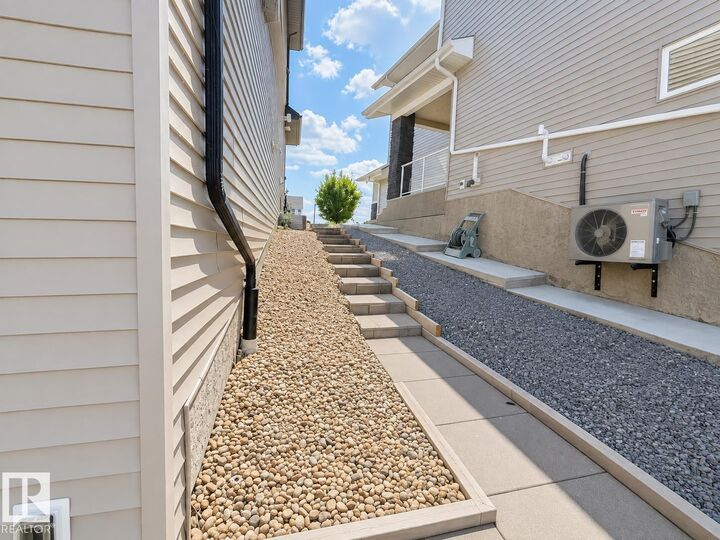 Property Photo: 1646 Davidson Green SW AB T6W 3J3