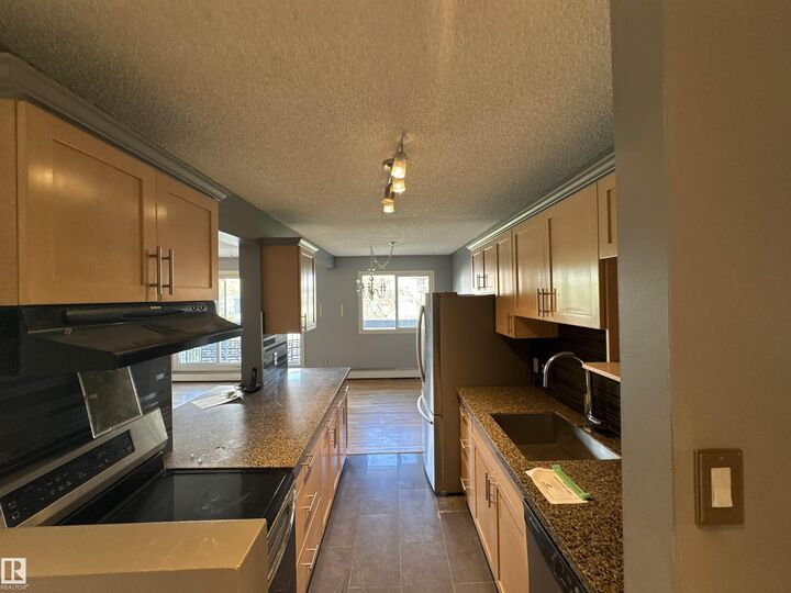 Property Photo: 11217 103 Avenue NW 425 AB T5K 2V9