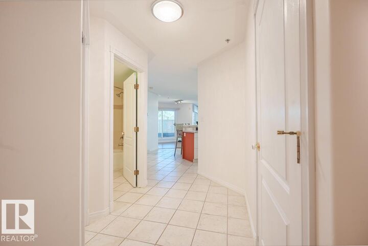 Property Photo:  12028 103 Avenue NW 108  AB T5K 2T9 