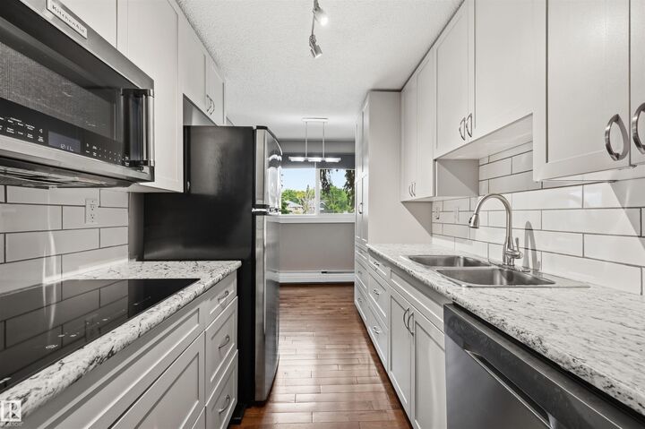 Property Photo:  9725 82 Avenue NW 201  AB T6E 1Y6 
