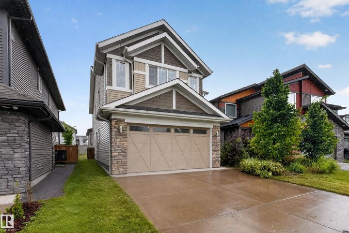 Property Photo: 7014 Chivers Loop SW AB T6W 3Y7