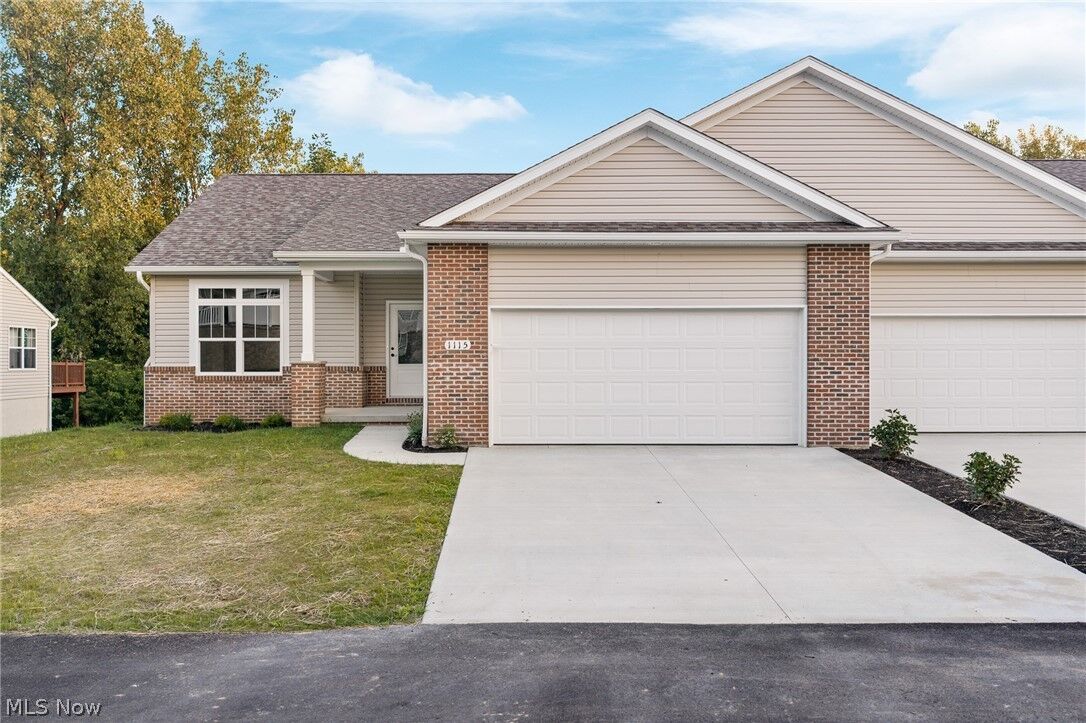 Property Photo: 1115 Queen Anne Drive NW OH 44647