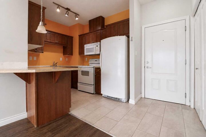Property Photo: 9229 Lakeland Drive 208 AB T8X 0B8