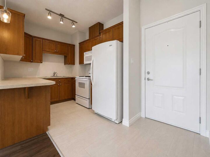 Property Photo: 9229 Lakeland Drive 208 AB T8X 0B8