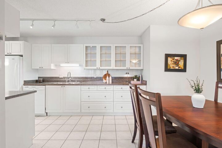 Property Photo:  202 Braeglen Close SW 2305  AB T2W 2B1 